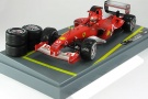 1:18-Ferrari F-2003 GA F1-No 1-with figurine driver Michael Schumacher with rain and dry tires-World Champion-2003-red-Hot Wheels – length: 25,30 centimeters